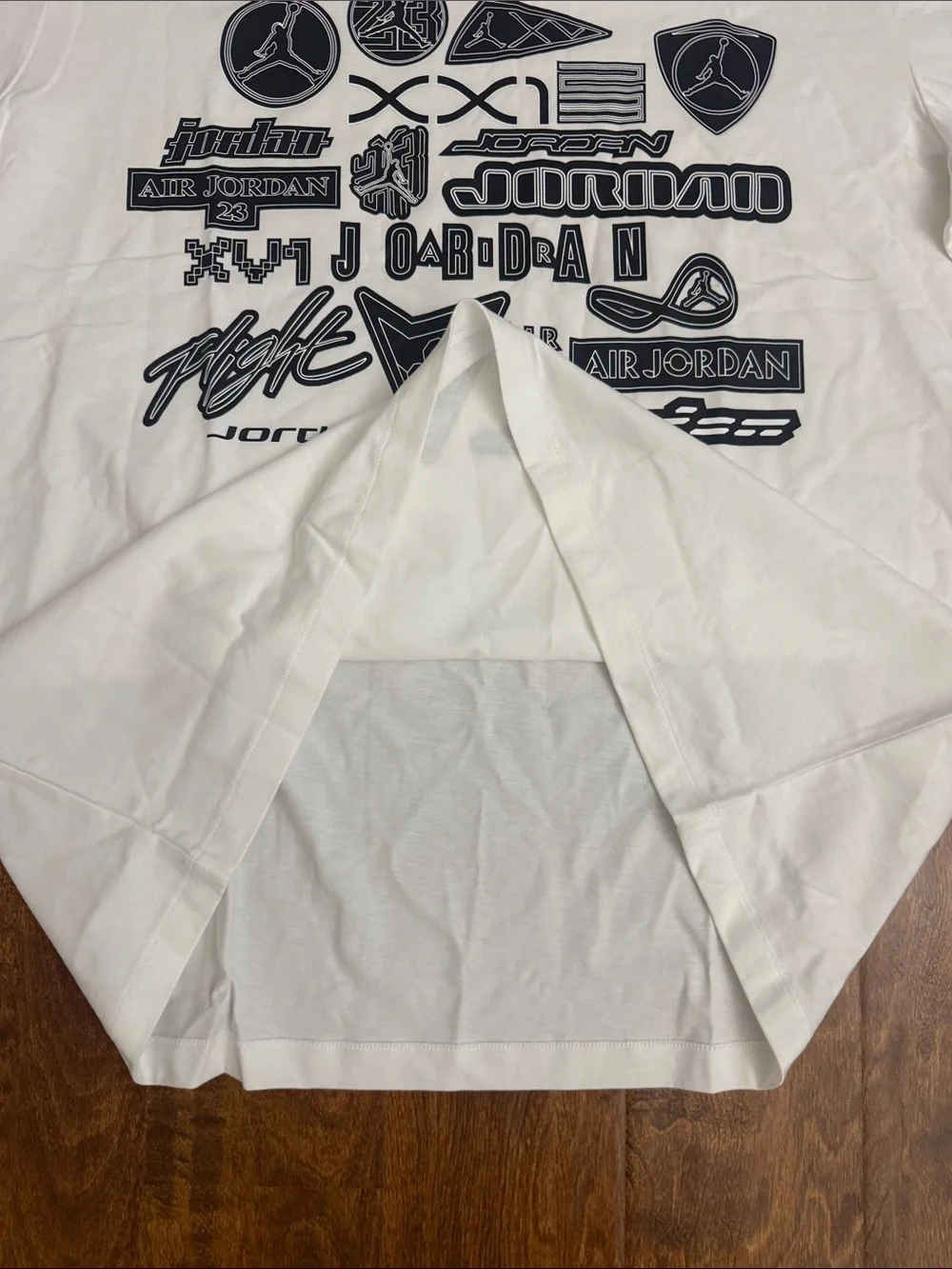 Jordan White Short-Sleeve Tee with Navy Logo Collage